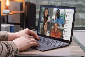 Someone using Teams and Microsoft 365 to enable remote work